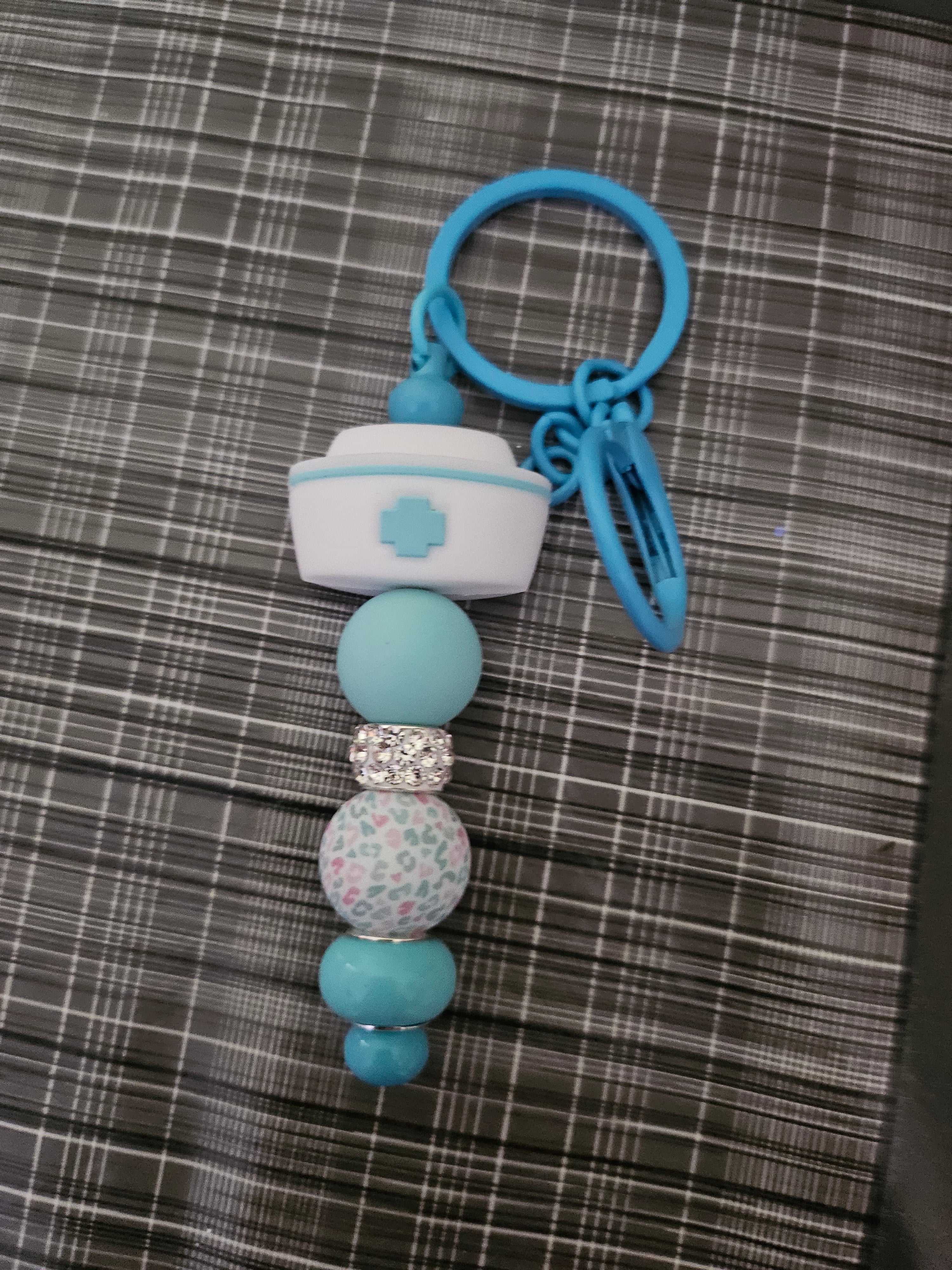 Bijoux de sac, porte clé ou marque page